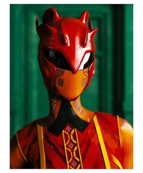 A character in a glossy red Power Ranger-style helmet with horn-like protrusions stands against a green paneled background, wearing red and gold armor.