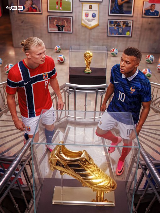 Two soccer stars, Erling Haaland in a red Norway #7 jersey and Kylian Mbappé in a blue France #10 jersey, stand facing each other on a spiral staircase around a golden boot trophy, with a World Cup trophy and framed soccer memorabilia in the background—mirroring the post's choice between Haaland and Mbappé and the "433" branding in the corner.