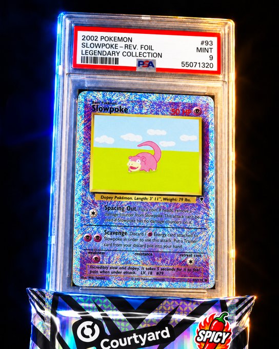 A graded PSA 9 MINT 2002 Pokémon Slowpoke Reverse Foil card from the Legendary Collection (#93) sits in its protective case, photographed against a colorful backdrop. The image showcases the rare $23K+ pull referenced in the caption, with "Courtyard" branding visible at the bottom of the display stand.
