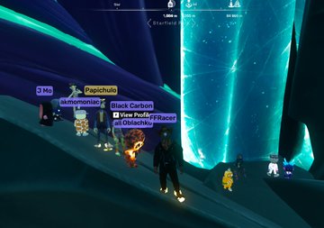 A video game scene showing multiple player characters in a glowing blue icy cavern environment, with usernames like 'Mo', 'Papichulo', 'Black Carbon', and 'NewProfileFracer' visible.
