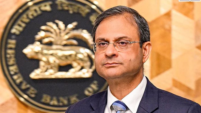 A man in a dark suit and blue tie stands in front of the Reserve Bank of India seal, which features the emblem of a tiger and partially visible text reading "...RVE BANK OF." The image relates to the accompanying post, which quotes RBI Governor Sanjay Malhotra discussing India's cautious stance on cryptocurrencies while supporting distributed ledger technology (DLT) and tokenisation.