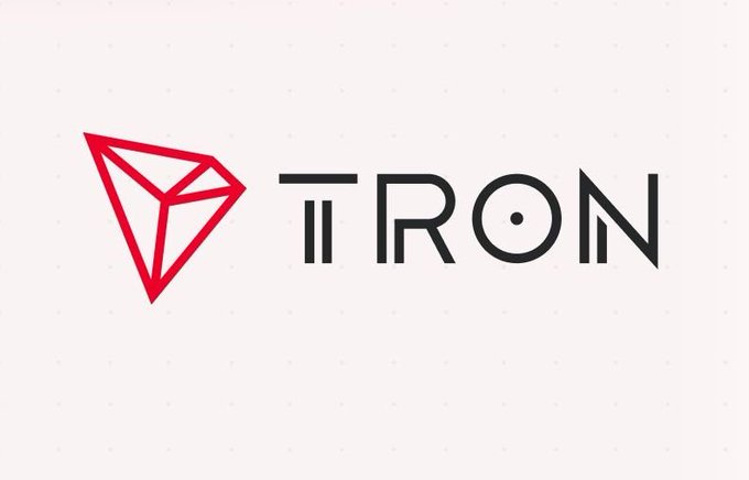 The TRON logo is displayed, featuring a red geometric diamond symbol next to the word 'TRON' in bold black letters on a white background.