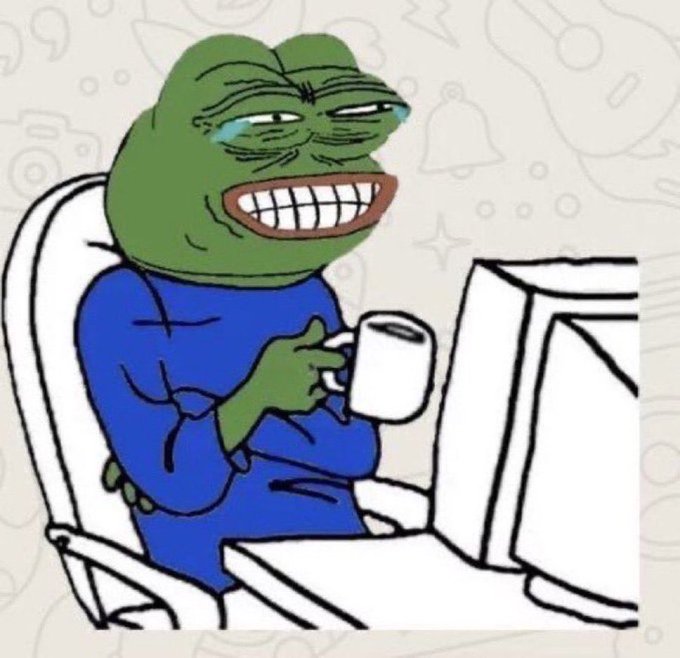 A cartoon-style illustration of a green Pepe-like frog character in blue clothing sitting at a computer, smiling widely while holding a white mug, set against a beige patterned background.