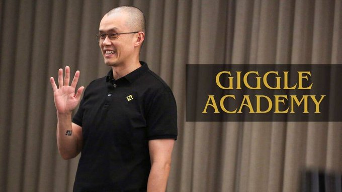 Binance founder Changpeng Zhao (CZ) waves while standing in front of "GIGGLE ACADEMY" text, illustrating his update that the free education platform has now reached 1.9 million children learners.