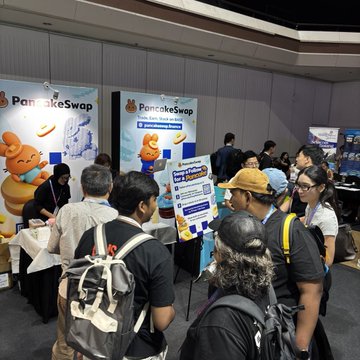 Here, PancakeSwap is featured in the @baseapac pavilion at @MalaysiaBCW, with a prominent booth showcasing their services and a QR code to their website. This image visually represents PancakeSwap's presence among other key builders in the Base ecosystem.