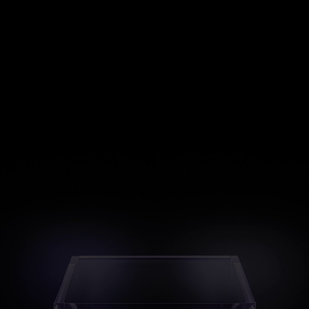 The image features a square glass object placed centrally against a black background. The object appears to be a tablet or computer screen, possibly from a laptop. The screen has a dark purple hue that contrasts with the surrounding darkness. The image also contains text elements such as "SpaceX exposure on @ZIGChain" and "@Valdora_finance", which may provide additional context about the content of the image.