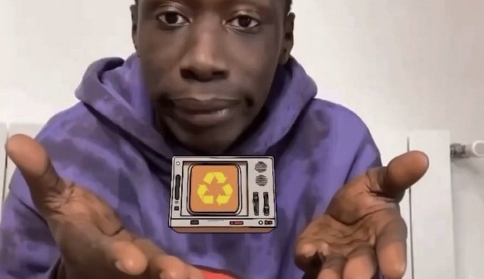 A young man in a purple tie-dye hoodie gestures toward a digital graphic of a retro TV displaying a yellow recycling symbol overlaid on the image.
