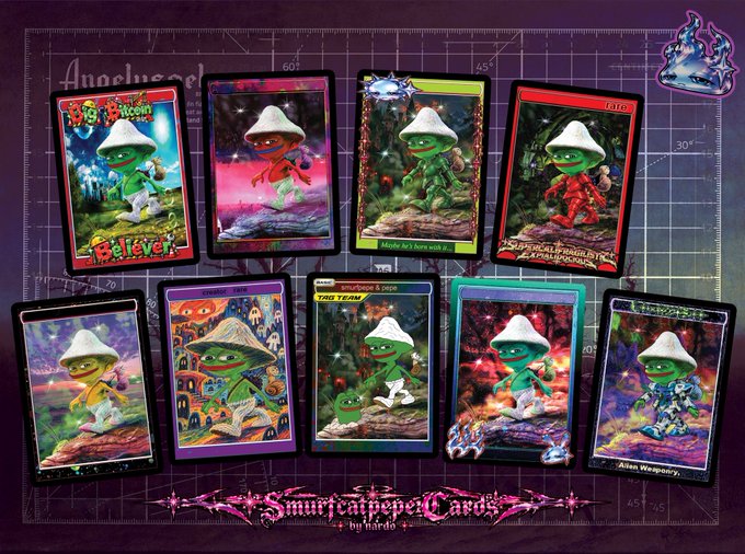 A display of 'Smurfcathelper Cards' by bürdo featuring 10 collectible trading cards with various Smurf-themed artworks and titles like 'Believer,' 'Rush from sword,' and 'Alien Weaponry' arranged on a purple grid background.