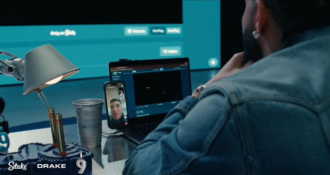 A birthday cake with "Drake 9" and the Stake logo is visible alongside a laptop and phone displaying a video call, hinting at the massive Stake tip mentioned.