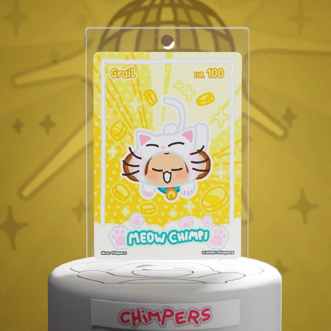 A yellow Chimpers trading card featuring a cartoon cat character labeled 'MEOW CHIMP!' with 'Grail' rarity and 'LVL 100' displayed, displayed on a white Chimpers-branded stand.