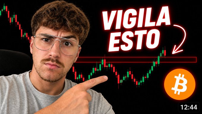 A man with glasses points at a Bitcoin chart overlay with the Spanish text 'VIGILA ESTO' and an orange Bitcoin logo, timestamped 12:44.