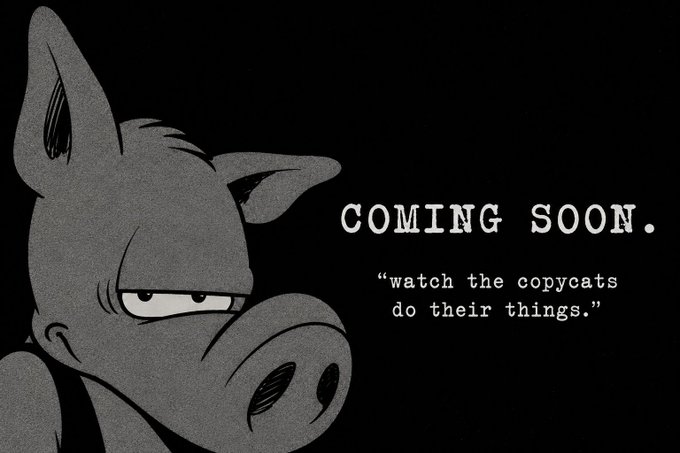 The image features a cartoon pig with a serious expression, sitting against a black background. The text "Coming Soon" is written above the pig's head, indicating that something new or exciting is about to happen. The phrase "Watch the copycats do their things." suggests that there might be some sort of competition or challenge involving the cartoon pig and other cartoon characters. This post seems to be promoting a sense of anticipation and excitement related to the upcoming event.