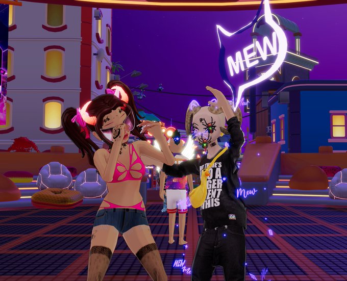 Two stylized 3D avatars pose together in a vibrant virtual world setting with purple lighting and a "MEW" neon sign overhead.