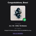 A dark notification screen displaying 'Congratulations, Boss!' and 'A.A. 122 - HOOK, The Blemish' for an NFT bid event.