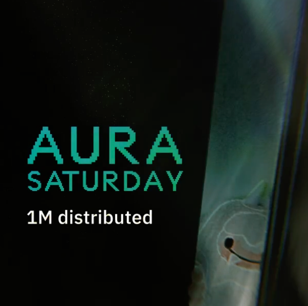 The image features a dark promotional graphic with teal text reading "AURA SATURDAY" and "1M distributed," showing a partial view of a person's face on the right side. It appears to celebrate the Aura Saturday event reaching 1 million in distribution, likely tied to the deposit event mentioned in the post.