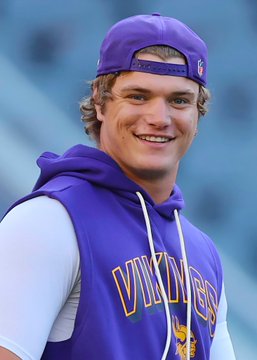A smiling young man wearing a backwards purple Minnesota Vikings cap and a purple Vikings hoodie stands on a field, appearing relaxed and confident. The post suggests this is J.J. McCarthy, who will serve as a backup quarterback behind Kyler Murray for the Vikings this upcoming season after going 6-4 as a starter last year.