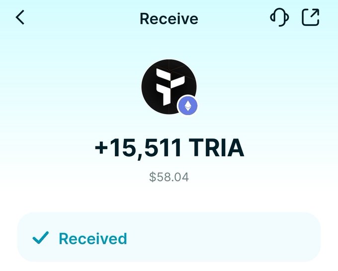 A mobile app screen showing a cryptocurrency transaction confirmation with the text 'Receive', '+15,511 TRIA', and a value of '$58.04' marked as 'Received'.