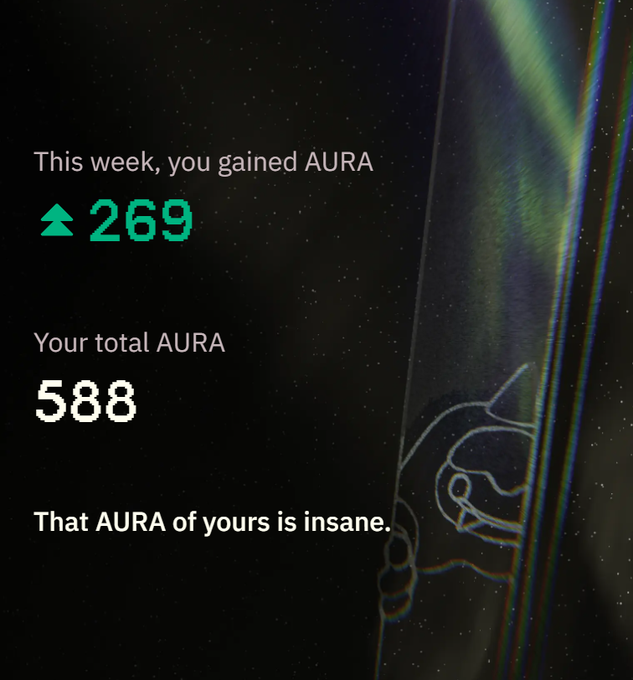 The image shows a poster with text that says "This week, you gained AURA" and has an upward arrow pointing to the number "269". The poster also includes a quote about the current state of the Aura cryptocurrency.