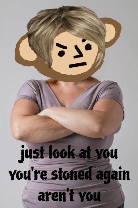 urny is depicted with crossed arms and a scowl, wearing a purple shirt against a gray background.