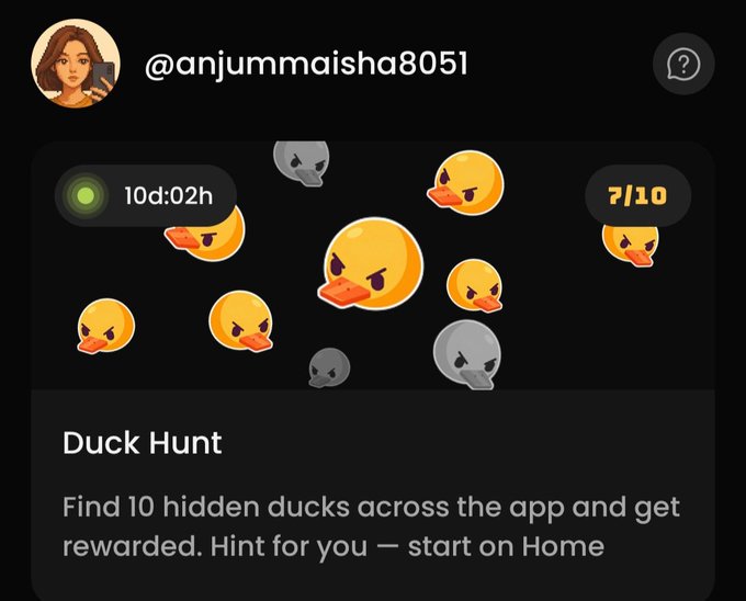 A social media post by @anjummaisha8051 titled 'Duck Hunt' showing a timer of 10d:02h and a score of 7/10, with the description 'Find 10 hidden ducks across the app and get rewarded. Hint for you — start on Home'.