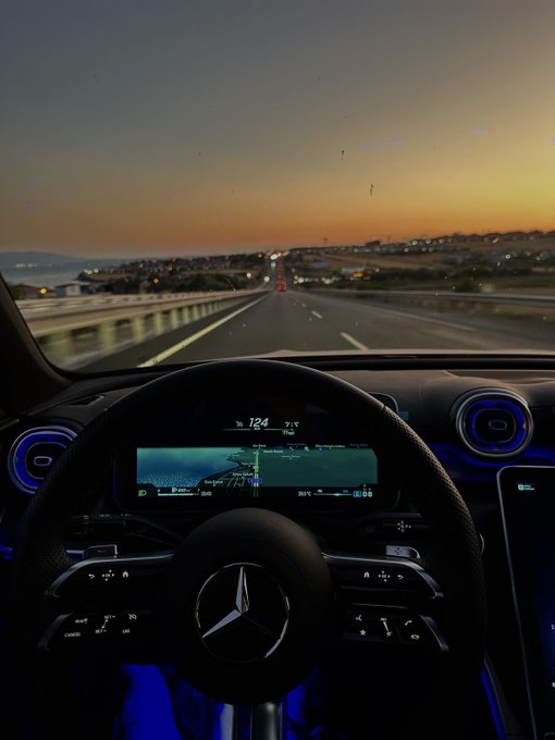 The image shows a car's dashboard with a display screen, likely an instrument panel or GPS system, which provides information about the car's speed, fuel level, and other relevant data. The setting appears to be at dusk, as indicated by the low light conditions in the background. The focus of the post is on how Web3 can make payments feel effortless for users, which would likely lead to increased adoption compared to traditional payment methods that may seem more complicated or time-consuming.