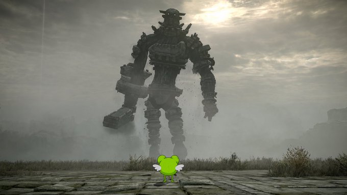 An image of a giant mechanical robot looming in a misty landscape, with a small cartoon frog character superimposed at the bottom center of the image.