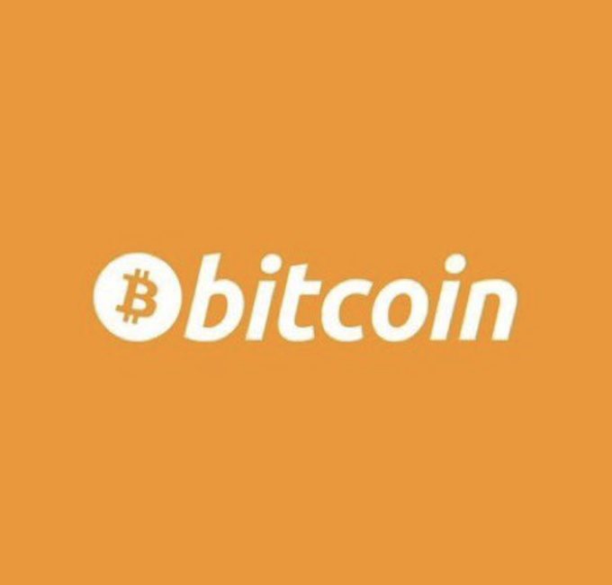 A Bitcoin logo with the iconic white "₿" symbol and "bitcoin" wordmark is displayed on a bright orange background, visually reinforcing the post's message about Emirates Airlines accepting cryptocurrency payments from millions of global customers.