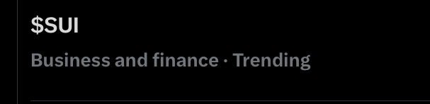 A black screen displaying the ticker '$SUI' under the category 'Business and finance · Trending'.