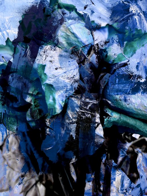 A close-up of an abstract painting with thick, textured brushstrokes in shades of blue, teal, green, black, and white.