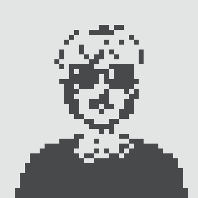 A pixelated, low-resolution grayscale portrait of a smiling person's face and shoulders on a white background.