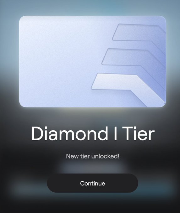 A digital achievement screen displaying a silver card design with the text 'Diamond I Tier' and 'New tier unlocked!' along with a 'Continue' button.