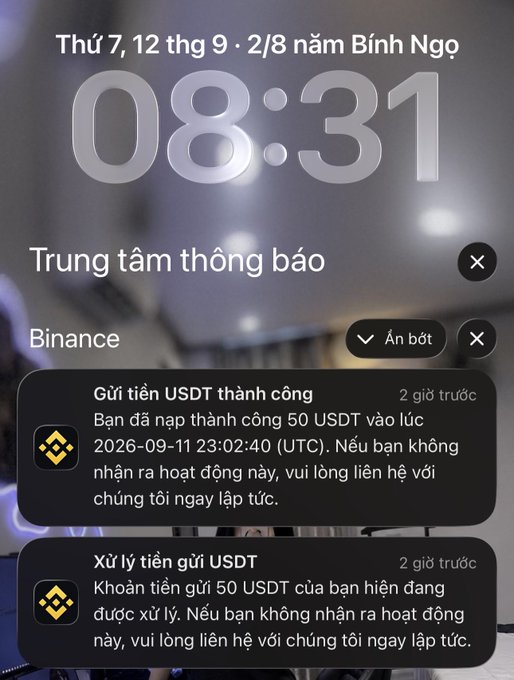 A smartphone notification screen showing the time 08:31 on Thursday, September 12 (Binh Ngo year), displaying Binance notifications in Vietnamese about a successful USDT deposit of 50 USDT and the processing of the deposit, with the Binance logo visible.