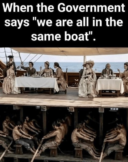 A political meme with the text 'When the Government says "we are all in the same boat".' It shows wealthy people dining comfortably on the deck of a ship above enslaved people rowing below.