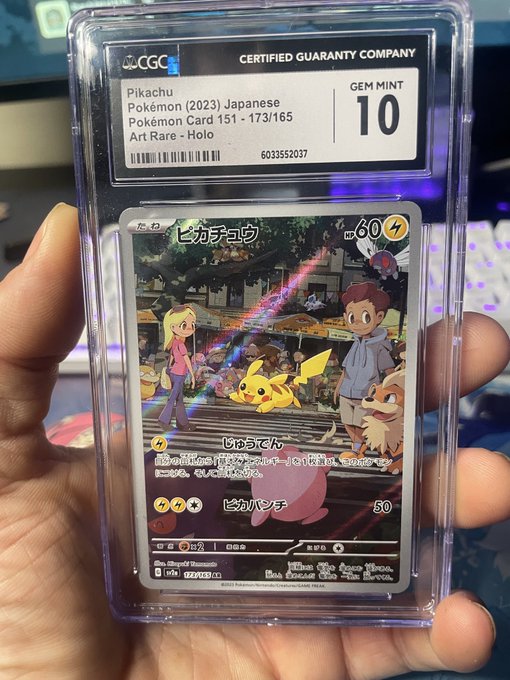 A hand holding a CGC Gem Mint 10 graded Pikachu (2023) Japanese Pokémon Card 151 #173/165, featuring artwork of Pikachu with characters on stairs.
