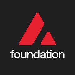A red "A"-shaped logo with the text "foundation" beneath it, representing the Avalanche ($AVAX) Foundation, accompanies news of the foundation buying back ~2 million AVAX coins at $7.20 to help reduce AVAT's debt.