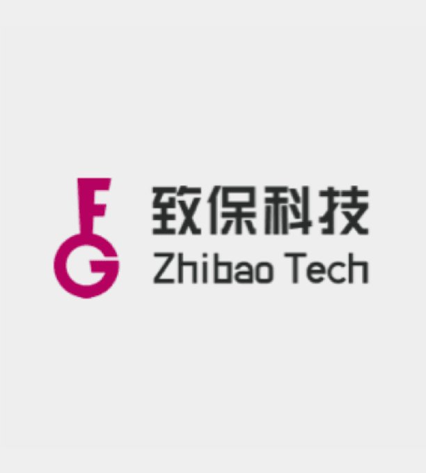 The image displays the logo of Zhibao Technology (致保科技), featuring a pink key-shaped icon with the letters "F" and "G" alongside the company's Chinese name and English branding "Zhibao Tech." This serves as the visual identifier for the company mentioned in the accompanying announcement about their $154.7 million Bitcoin acquisition adding 2,380 BTC to their corporate treasury.