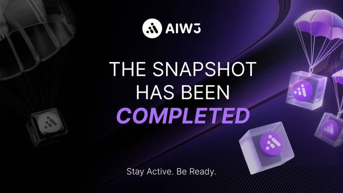The @AIW3_official logo is displayed with the text "THE SNAPSHOT HAS BEEN COMPLETED", indicating they are nearing their TGE. The image relates to the post by visually representing the completion of a snapshot, a key step before token distribution, drawing parallels to the idea of users having "something meaningful to do" before the token arrives.
