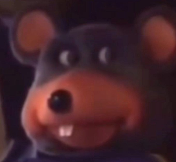 A close-up, blurry image of a cartoon beaver character (appearing to be from a popular meme) with large front teeth, giving a skeptical or side-eye expression that humorously matches the post's sarcastic doubt about whether any good airdrops have occurred in 2026.
