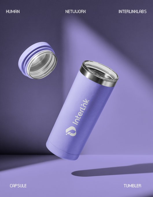 A purple insulated tumbler labeled 'Interlink' with its matching lid floating above it, set against a purple background with labels 'CAPSULE' and 'TUMBLER'.