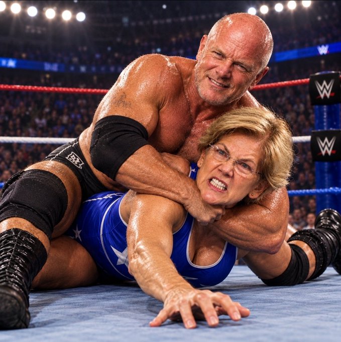A bald wrestler is shown grappling with a woman in a blue wrestling singlet in a WWE ring, with the 'W' logo visible on the turnbuckle.