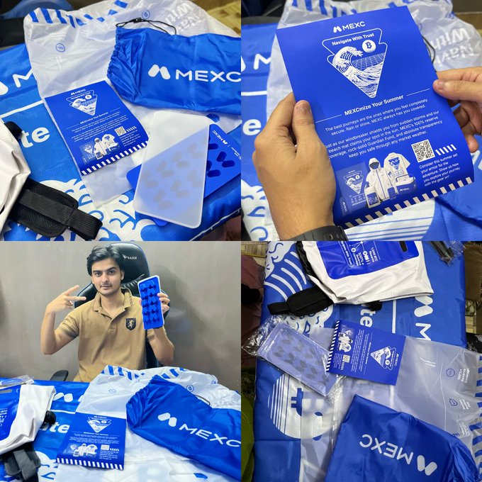 A person shows off their MEXC summer merch, including a blue drawstring bag, a "Navigate With Trust" guide, a sticker sheet, and a branded phone case, with a MEXC-patterned jersey spread out nearby.