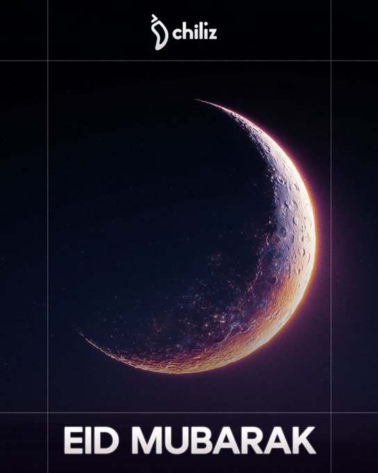 The image features a crescent moon with pink and purple hues, set against a dark blue sky. The caption below the image reads "Eid Mubarak" which indicates that this photo was taken during the celebration of Eid al-Adha.
