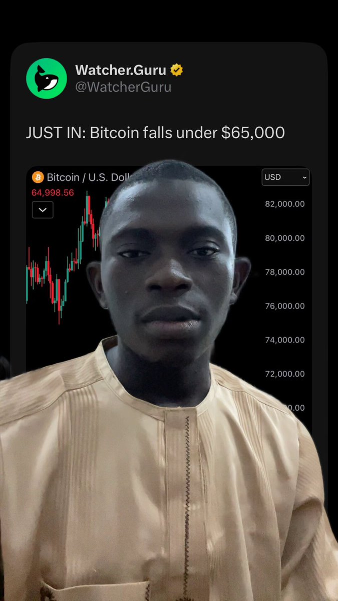 The image shows a man's face displayed on a cell phone screen with a message about Bitcoin falling under $65,000. The person has a black hair color and is wearing a tan shirt.