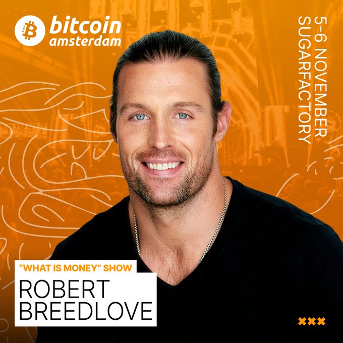 Promotional graphic for Bitcoin Amsterdam featuring Robert Breedlove of the 'What is Money' show, dated 5-6 November at SugarFactory, with an orange background.