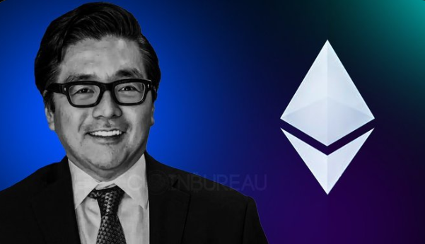 The image shows a man wearing glasses, possibly an IT professional, smiling while looking directly at the camera against a blue backdrop with an advertisement for Whale Watch and the name "ETH". In the background of the image, there are three triangular symbols representing the currencyETH. The man's smile suggests that he is happy or proud about something related to the cryptocurrency market or whale watching event.