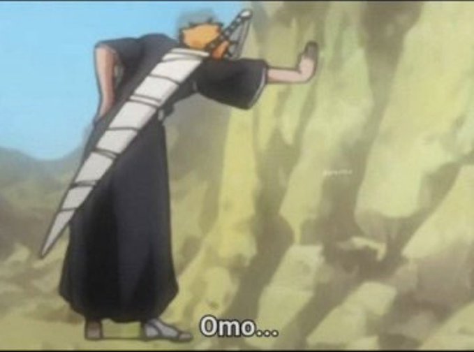An anime screenshot of a character with orange hair and a large sword strapped to their back leaning against a rock wall, with the subtitle 'Omo...' displayed.