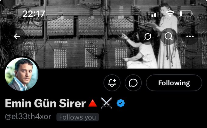 Twitter/X profile page for Emin Gün Sirer (@el33th4xor) with 'Following' button, showing a black and white banner of vintage telephone operators.