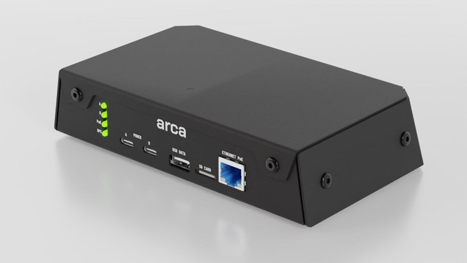 A sleek black "arca" branded electronic device, likely a cryptocurrency hardware wallet, featuring USB ports, an SD card slot, an Ethernet port, and LED indicators. The device suggests secure storage of digital assets, contrasting ironically with the post's claim about customer funds being lost.