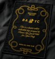 A dark, ornate book or journal cover with gold decorative borders and the visible text 'RA YC' on its label.