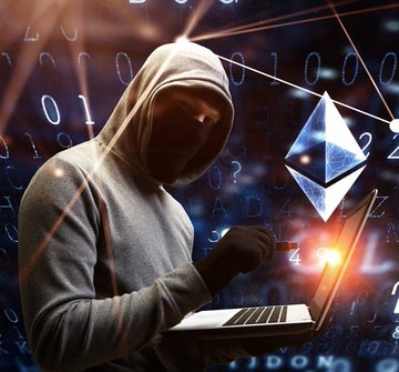 A hooded hacker using a laptop with the Ethereum logo floating above, set against a digital background of binary code and network connections.
